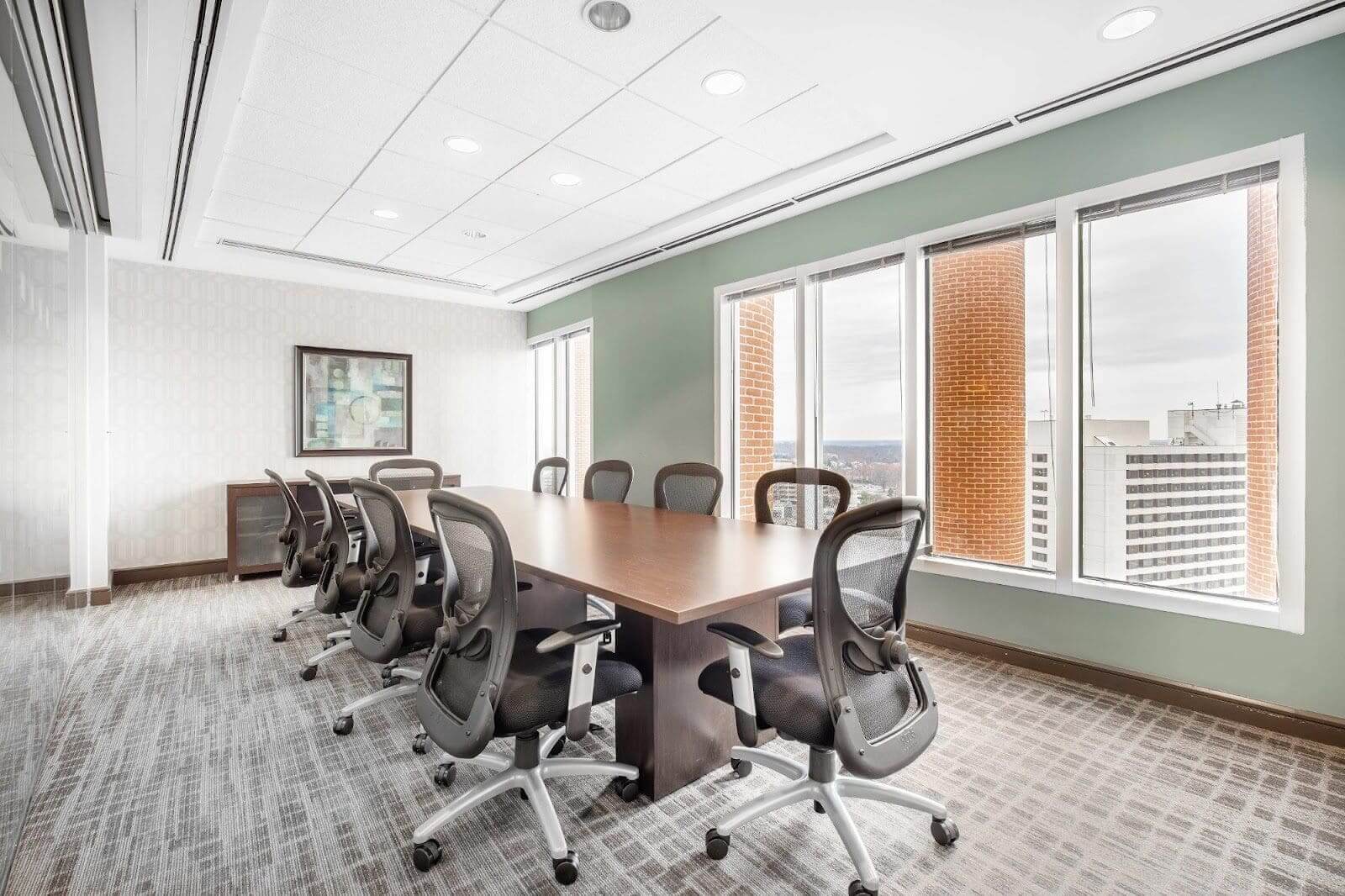 Modern conference room with city view.