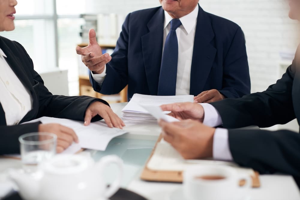 a team of attorneys going over files
