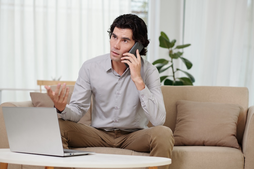a man taking a business call