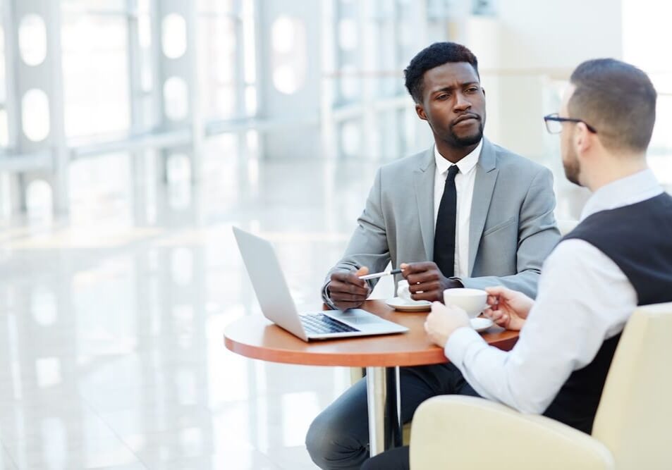 two men having a work meeting
