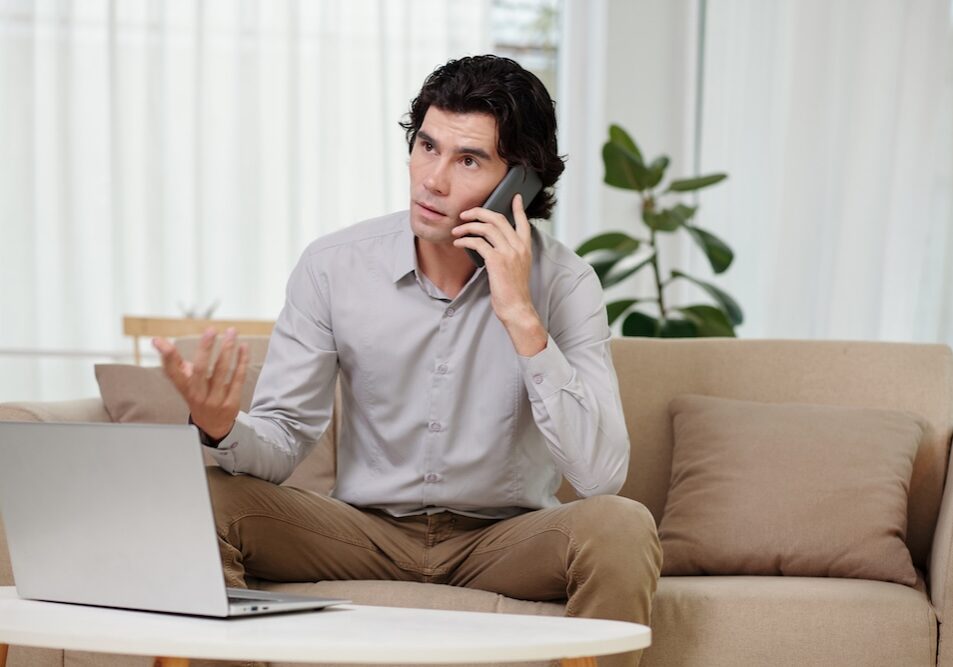 a man taking a business call