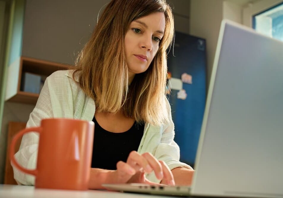 a woman working on a laptop